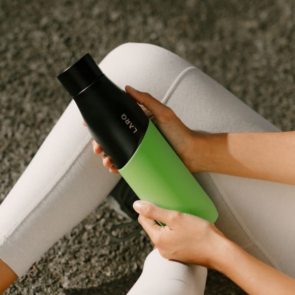 Photo of Larq Bottle PureVis&trade; - Black / Vert in hands