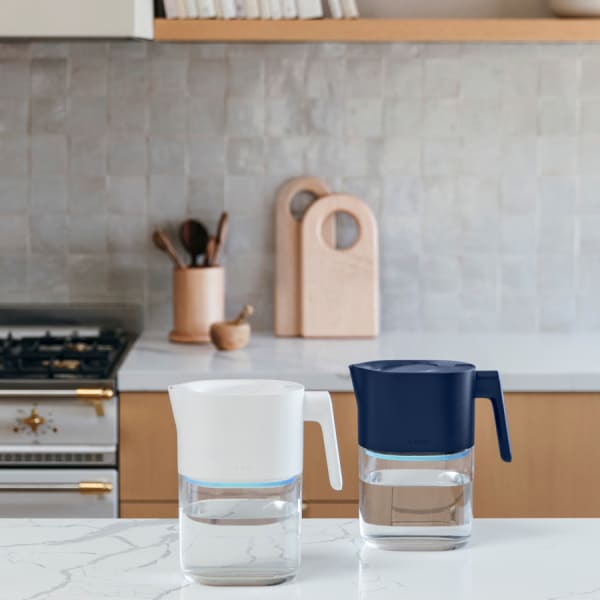 Photo of Larq Pitcher PureVis&trade; - Monaco Blue & Pure White on a kitchen counter