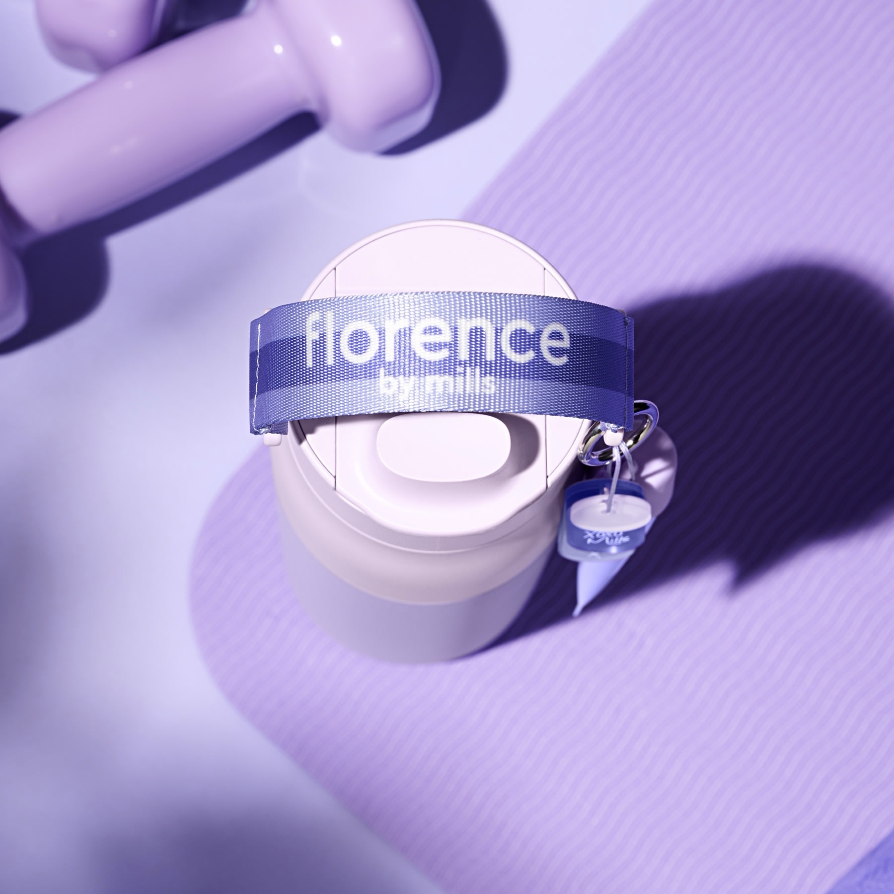 The florence by mills nylon handle across the bottle&rsquo;s cap, seen from above