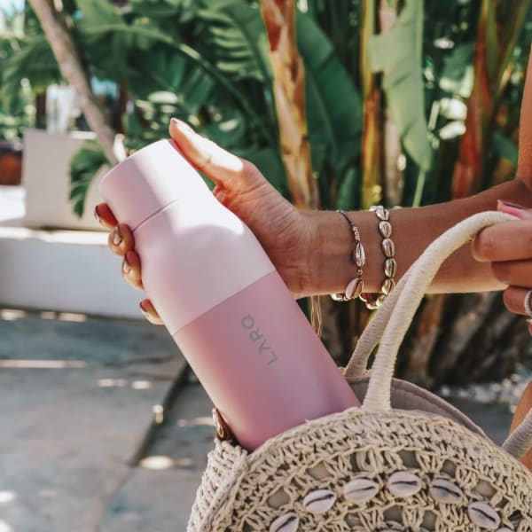 Photo of Larq Bottle PureVis&trade; - Himalayan Pink in hands