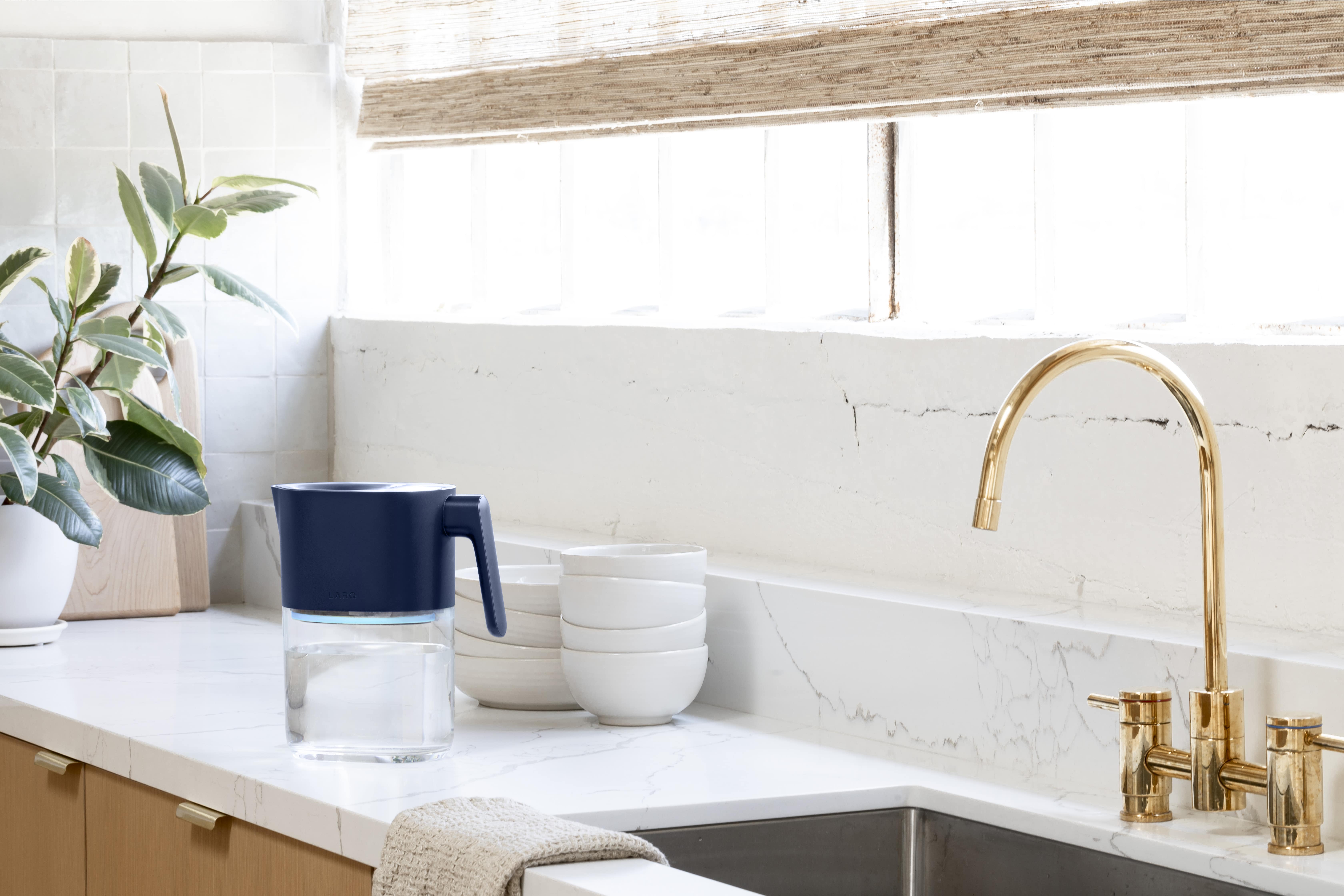 Larq pitcher alongisde water tap
