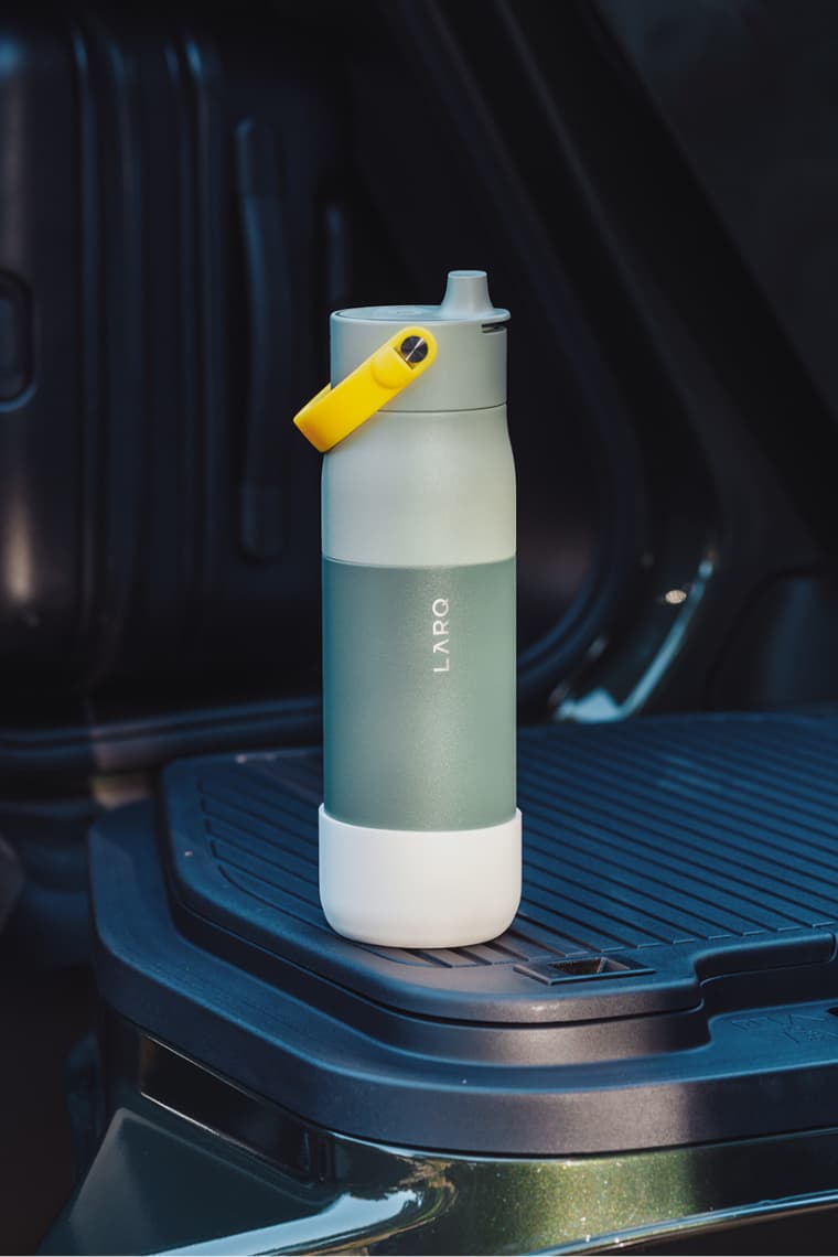 LARQ Bottle with LARQ Silicone Boot and Neon LARQ Bottle Handle